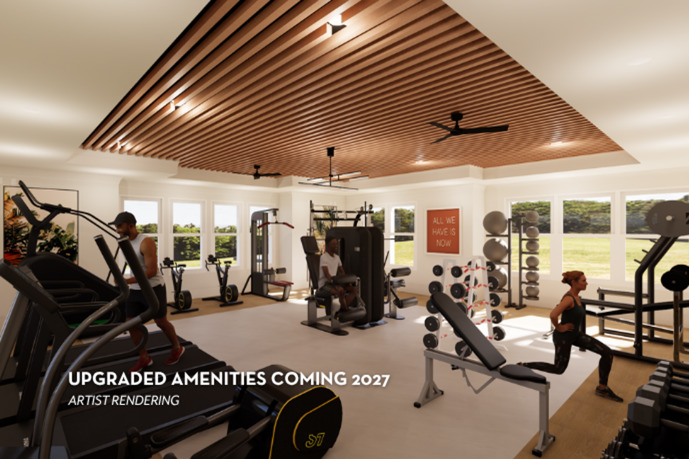The fitness center is equipped with modern exercise machines located at St James at Goose Creek. 